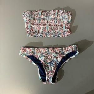 Ruched strapless swimsuit in burgundy and green